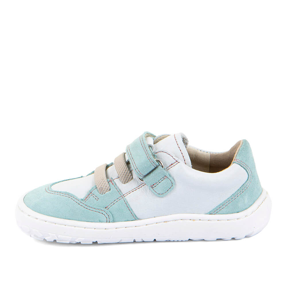 Light blue and white sneaker with velcro straps on