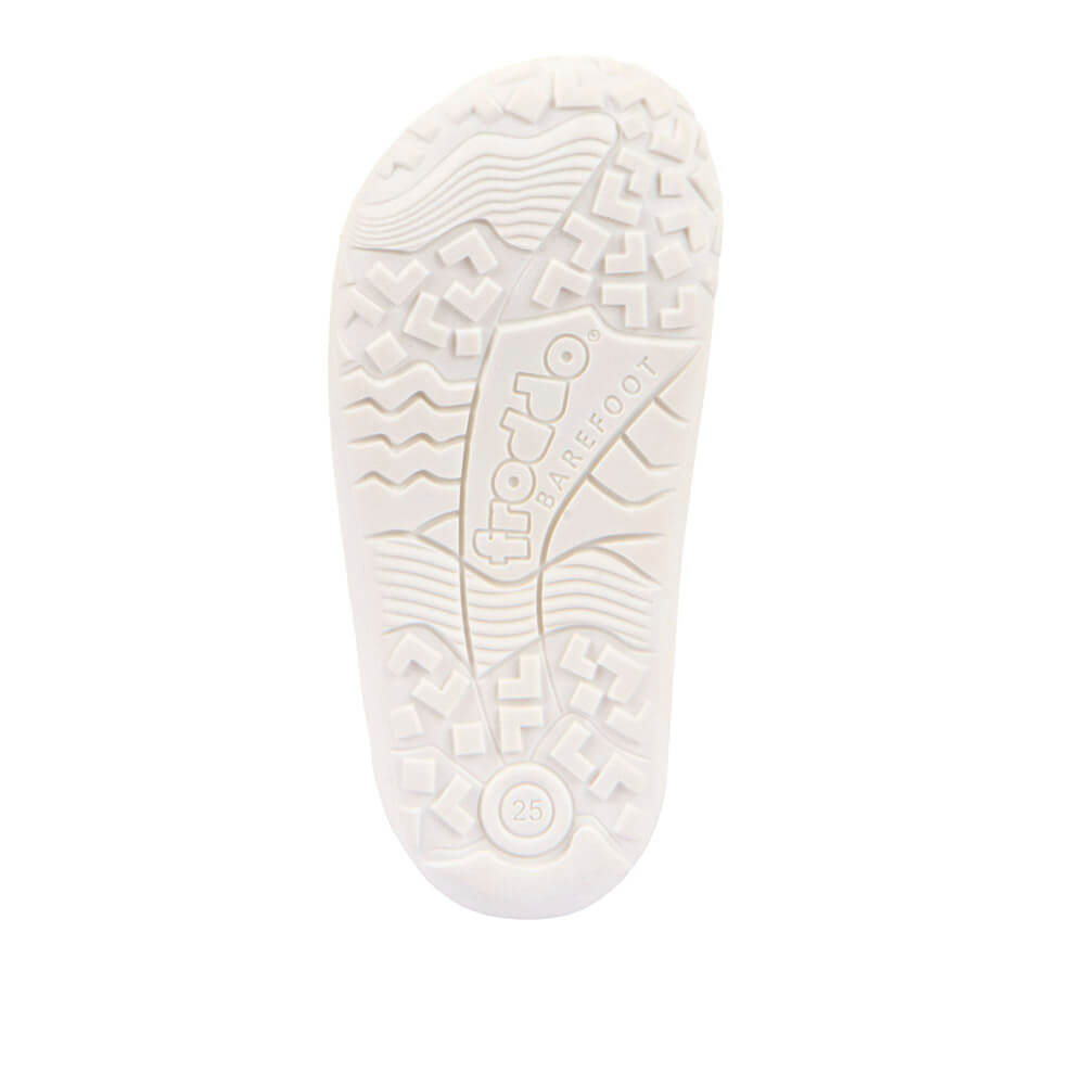 White sole of a shoe with brand logo 